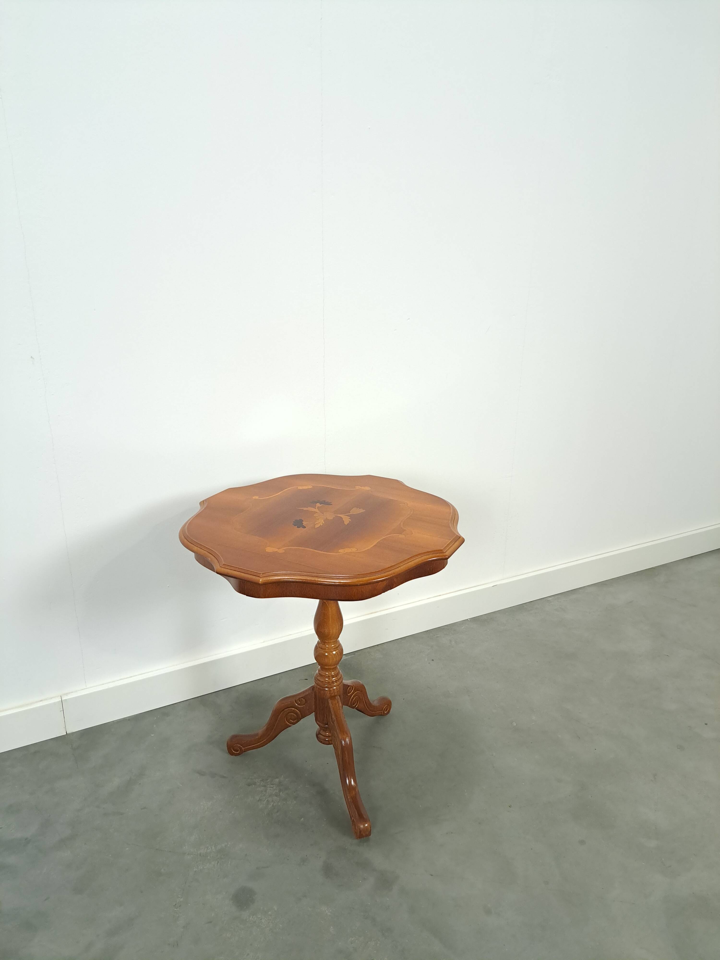 Round vintage wooden side table with inlaid veneer
