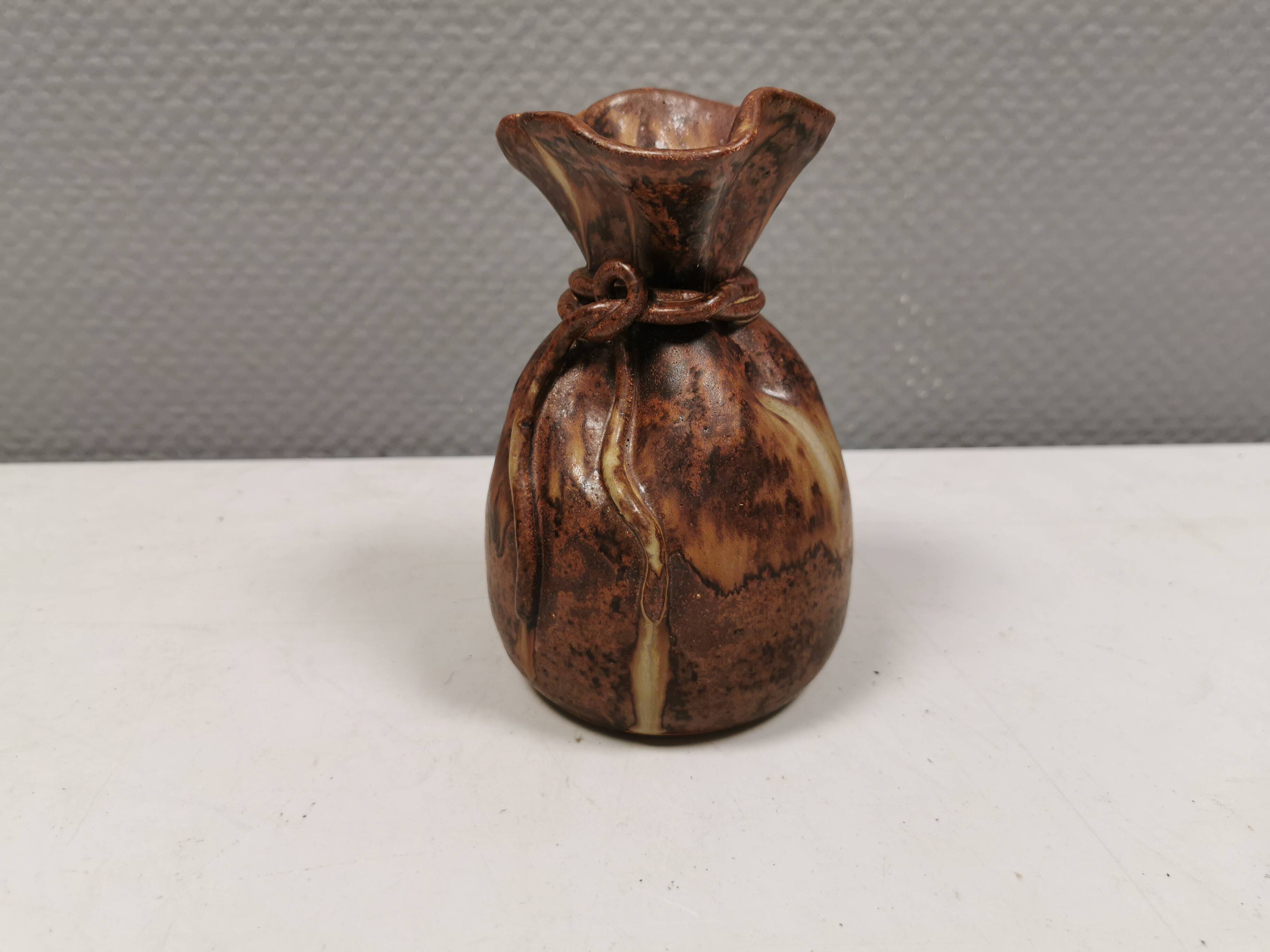 vase shaped like a money bag, in beautiful earthy colours.
