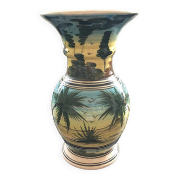 Decorative vase with palm trees