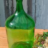 Superb antique green glass demijohn.