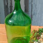 Superb antique green glass demijohn.