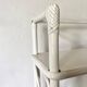 Vintage white lacquered rattan shelf