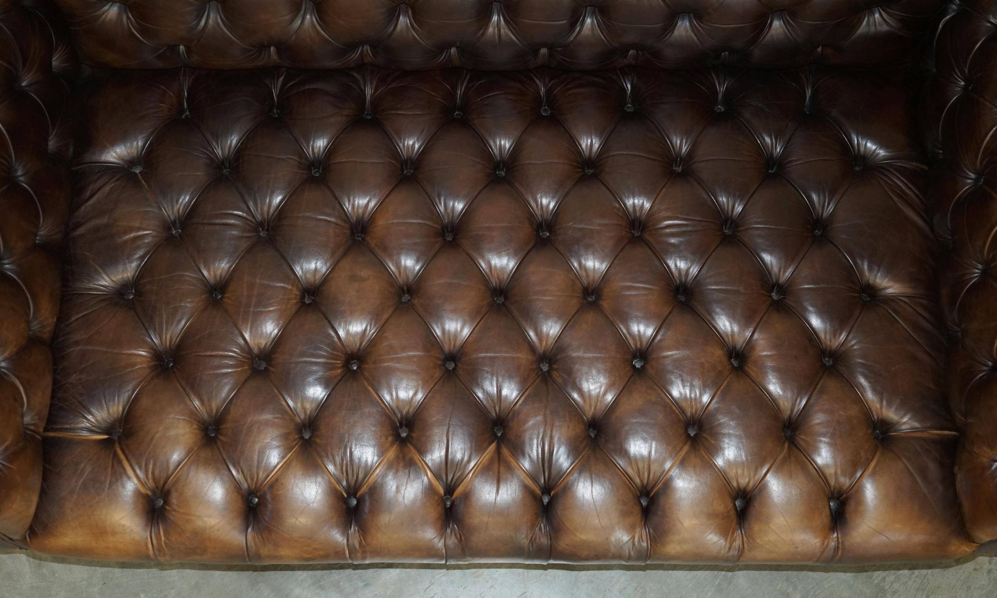 Vintage oversized Chesterfield canapé in hand-dyed leather.