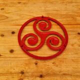 Triskelion cast iron trivet
