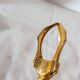 Vintage gold sugar tongs with case