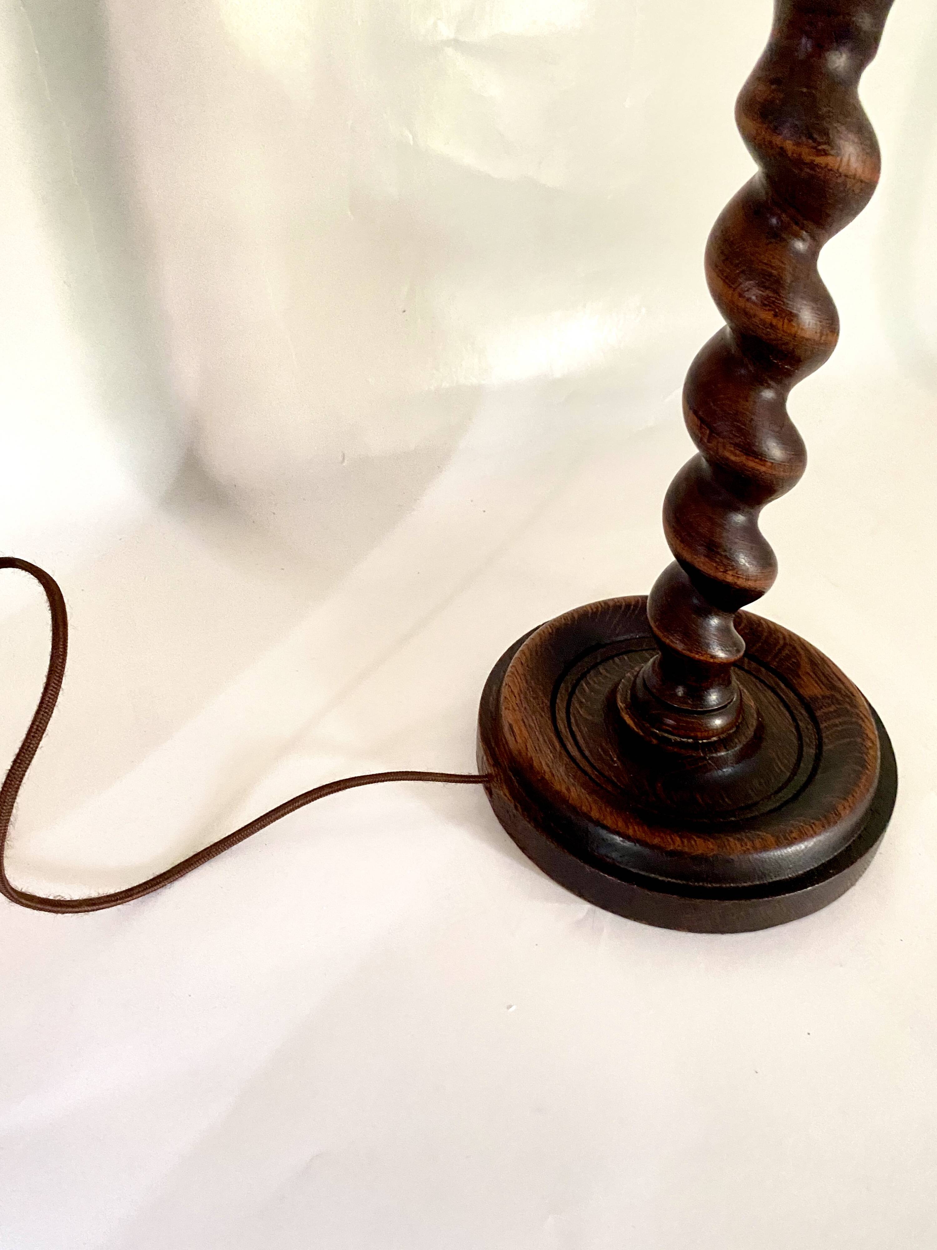 Turned wooden lamp, fabric cable, cotton lampshade.