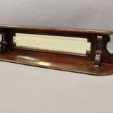 Display shelf with beveled mirror