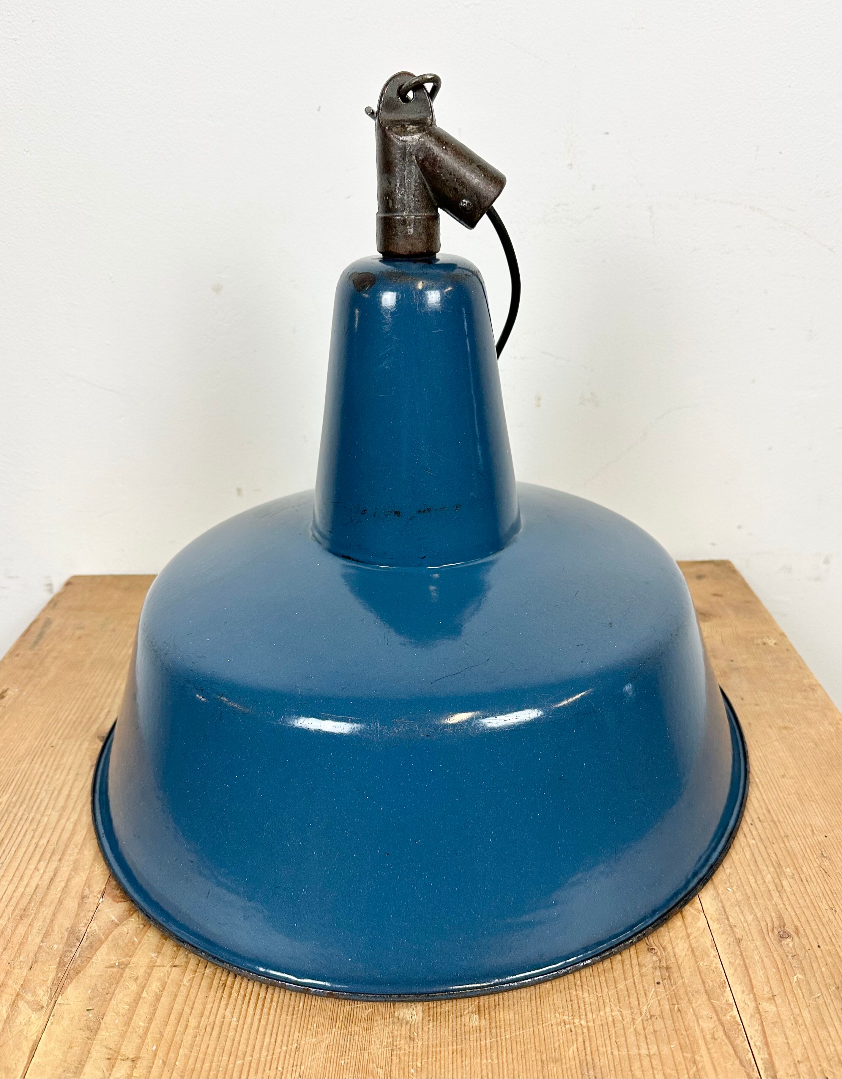 Industrial blue enamel factory lamp with cast iron top, 1960s