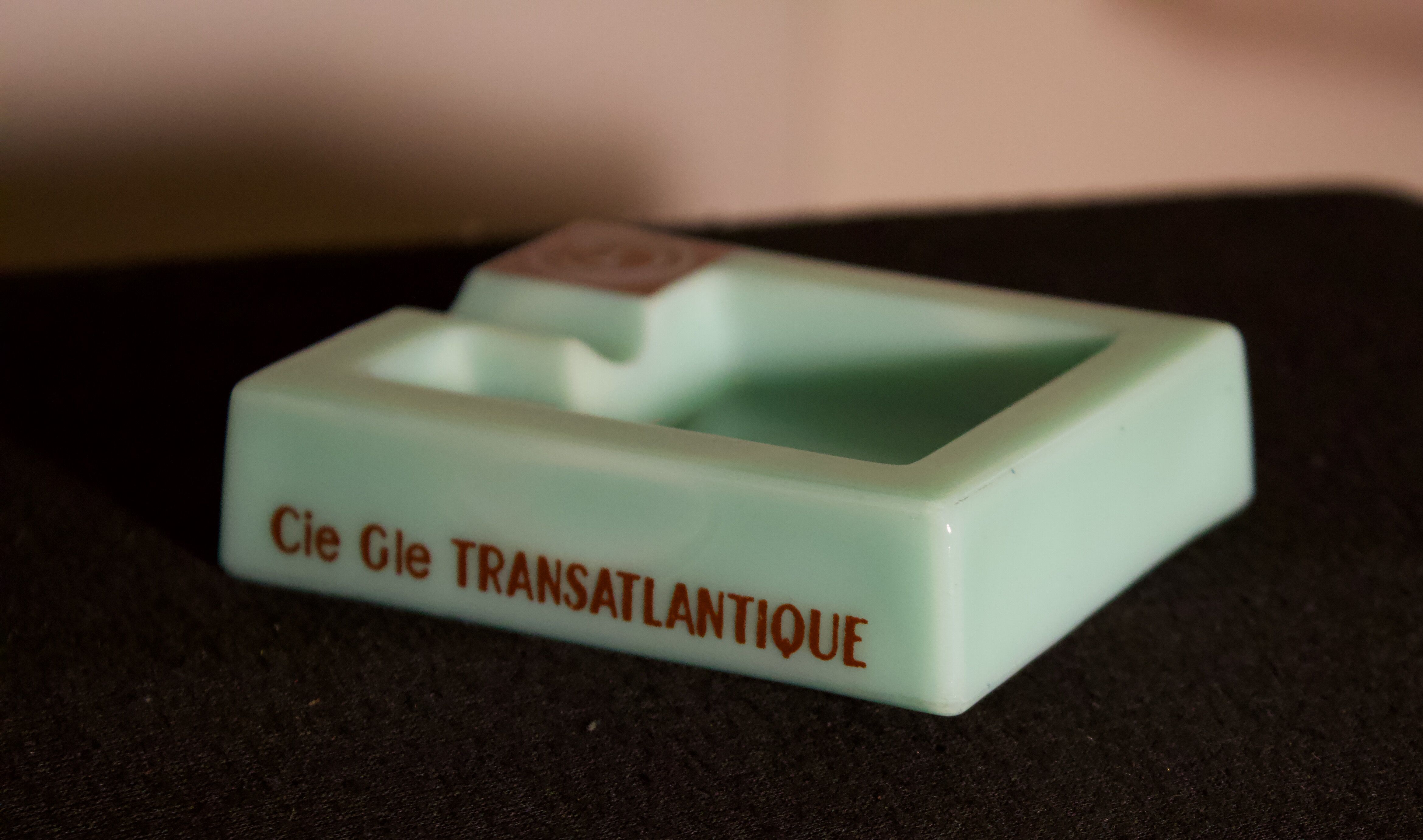 Three opalex ashtrays at the Logo of the Trans-Atlantic General Company - French Line - Model created by Jean Luce for the cruises of the liner Normandy and France