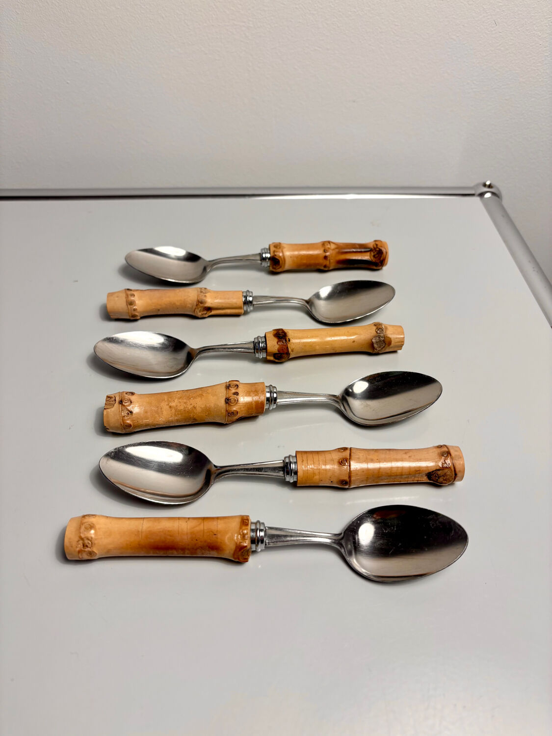 Set of 6 vintage dessert spoons with bamboo handles.
