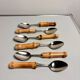 Set of 6 vintage dessert spoons with bamboo handles.