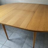 Vintage round table from the 60s with butterfly extension