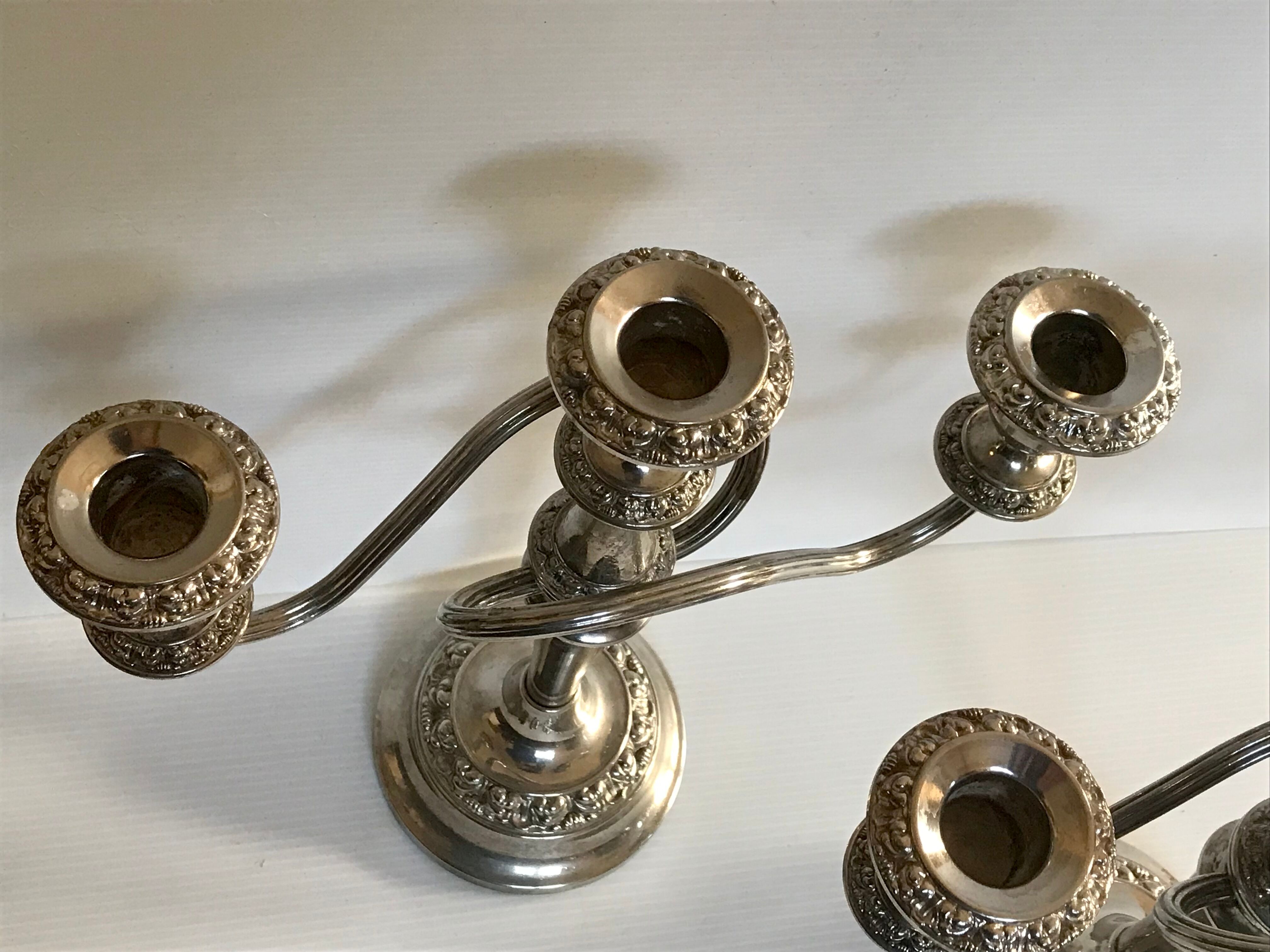 Pair of silver metal chandeliers