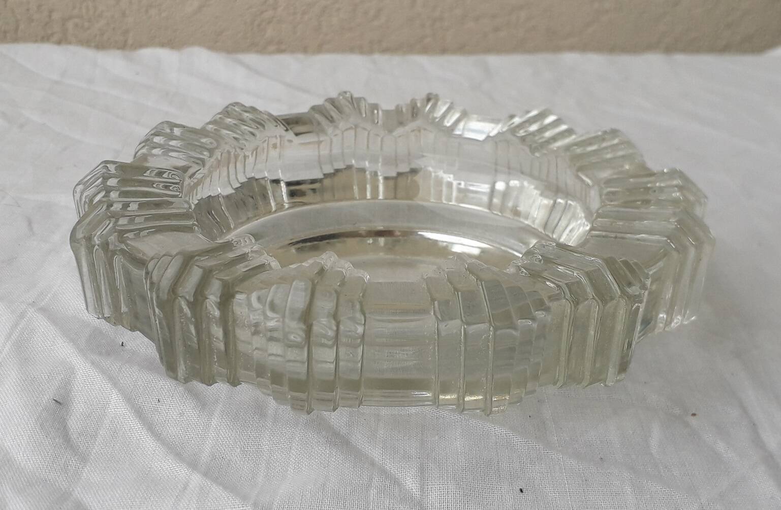 Ashtray or glass catchall.