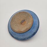 Blue cat ashtray lying down