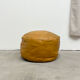 Ochre leather patchwork pouf