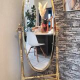Vintage horse mirror in patinated steel with golden brass effect 1980
