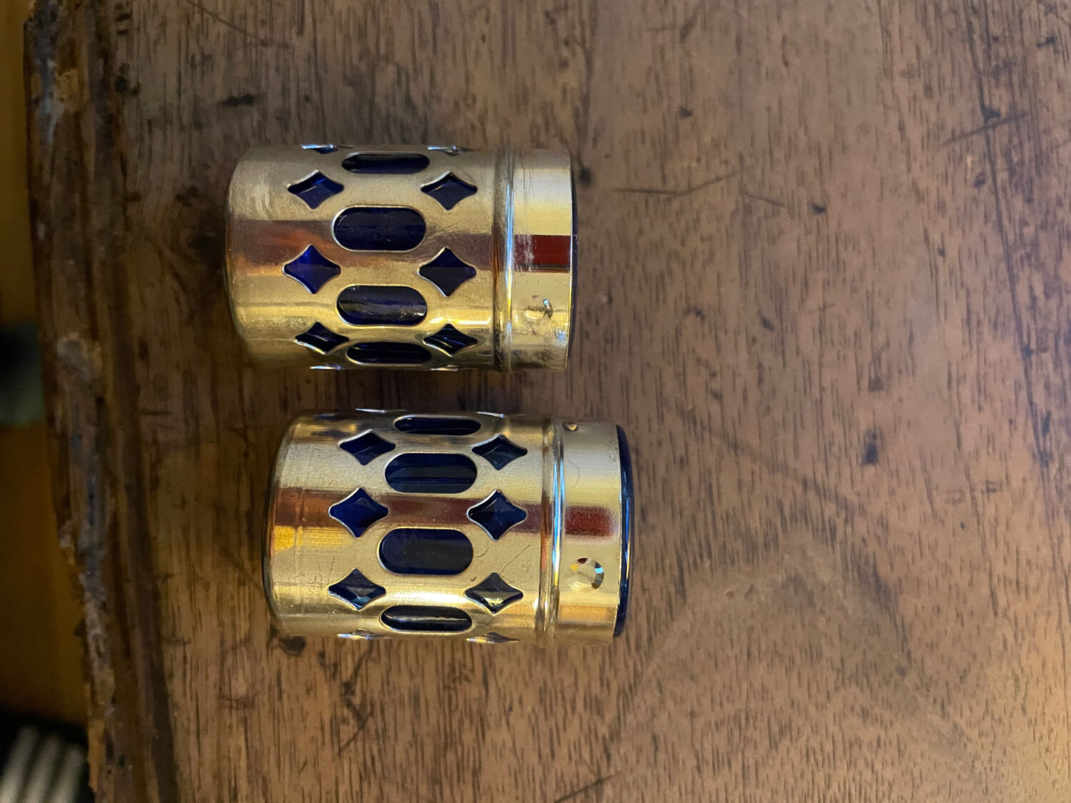 Vintage pepper shaker duo