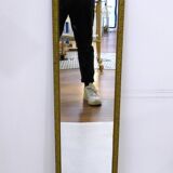 Large elongated gilded mirror