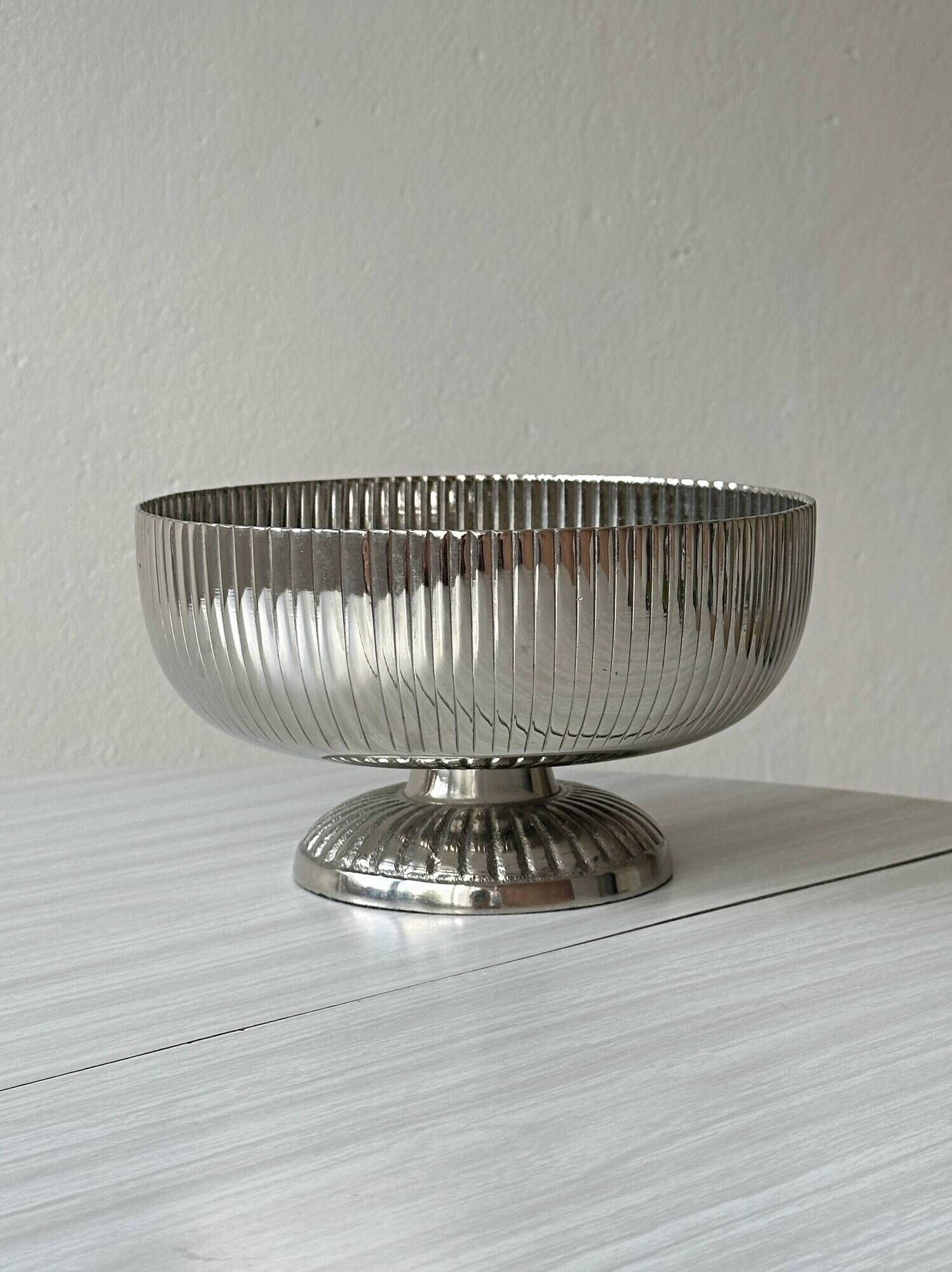 Silver stainless steel pedestal bowl