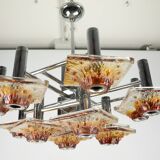 12-light Mazzega chandelier in amber and clear murano glass and chrome. Ita