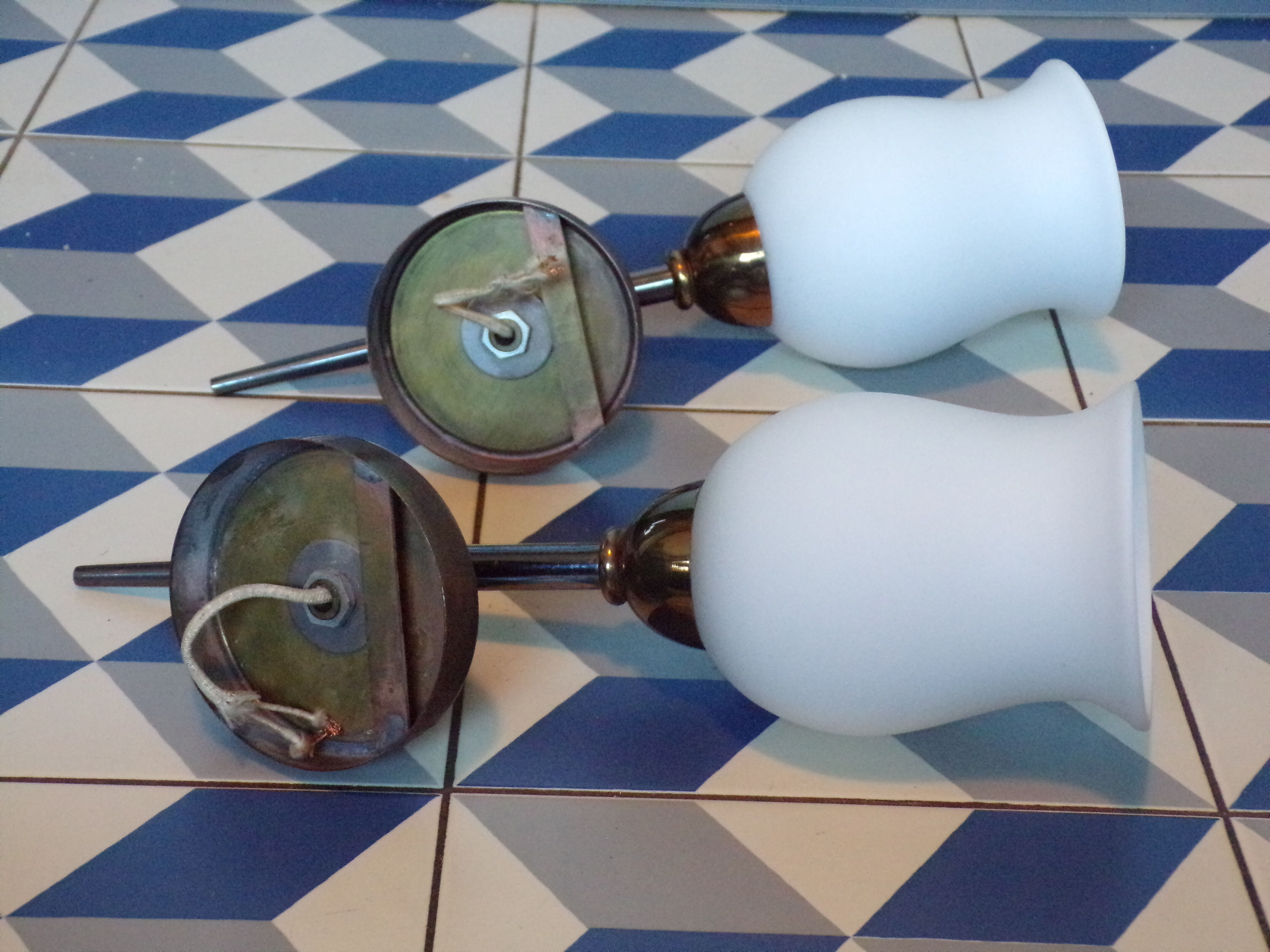 Pair of 1960 brass torch wall light