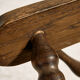 Oak armchair with three legs