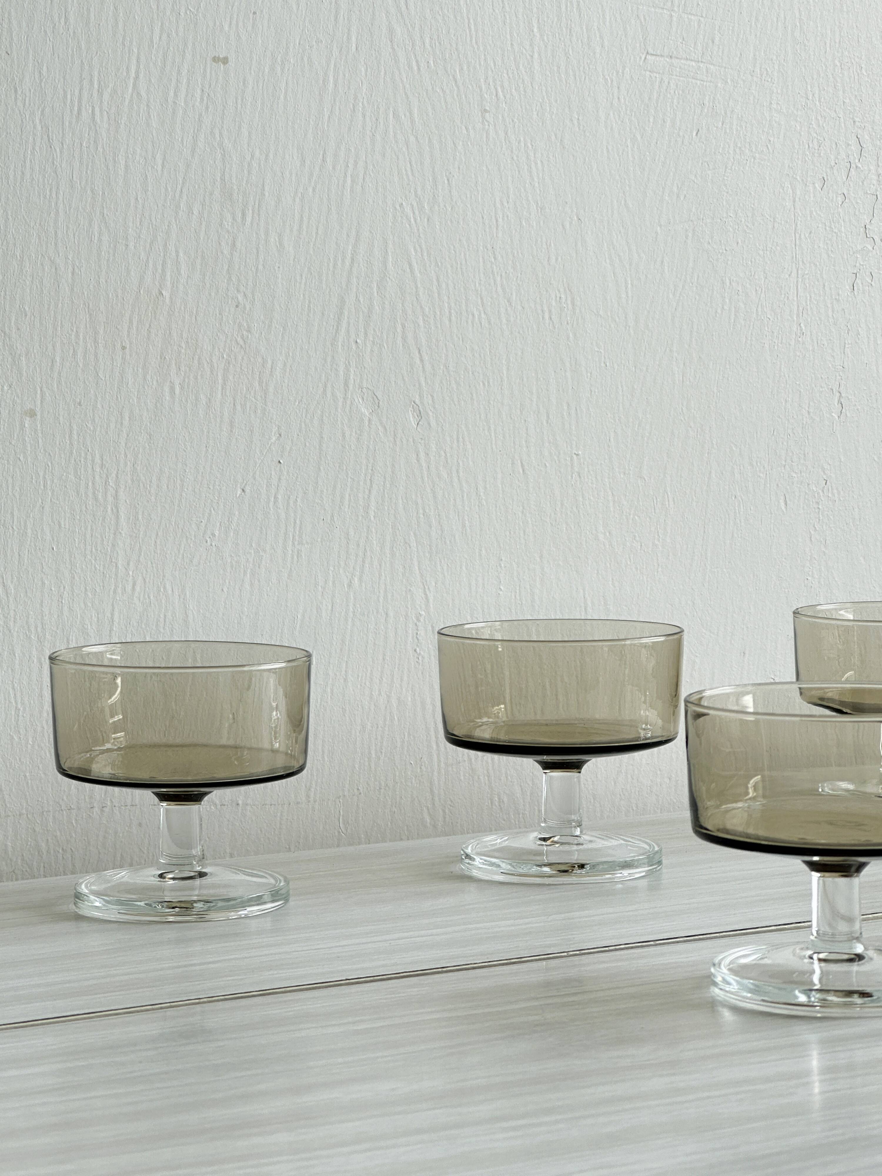 5 smoked glass dessert bowls.