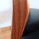Four antique Scandinavian-style chairs made of solid wood and faux leather.