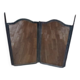 Metal fireplace screen made up of 4 leaves
