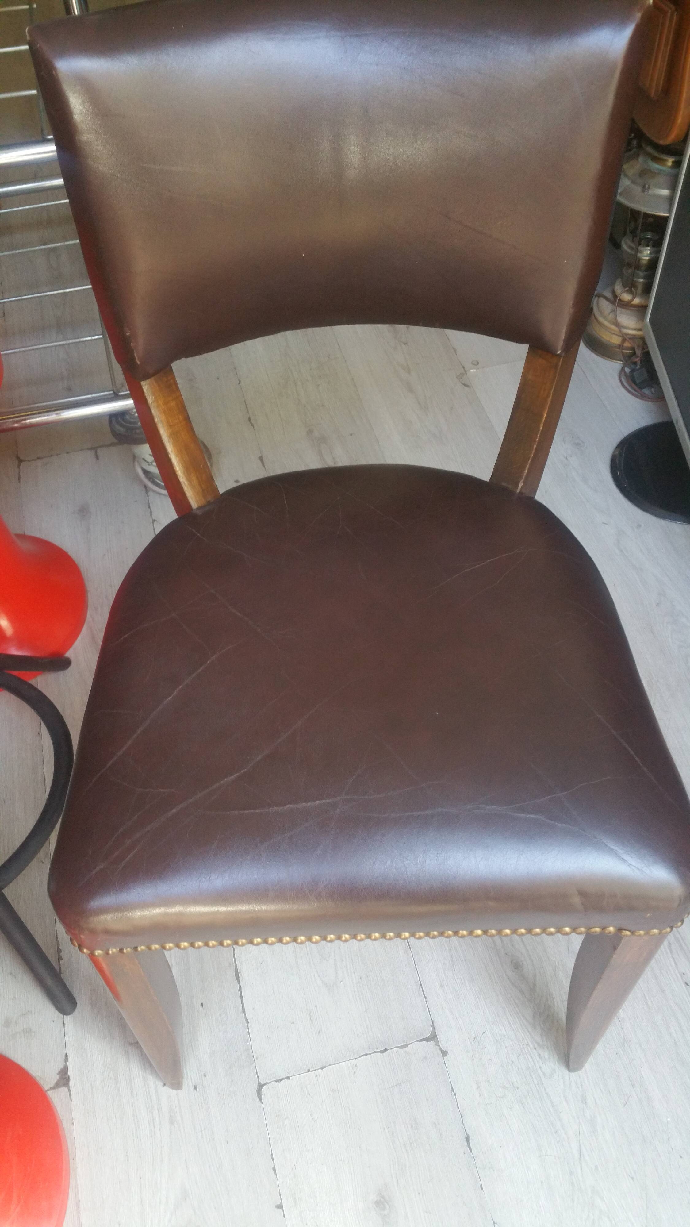 Lot of leather and vintage wood chairs