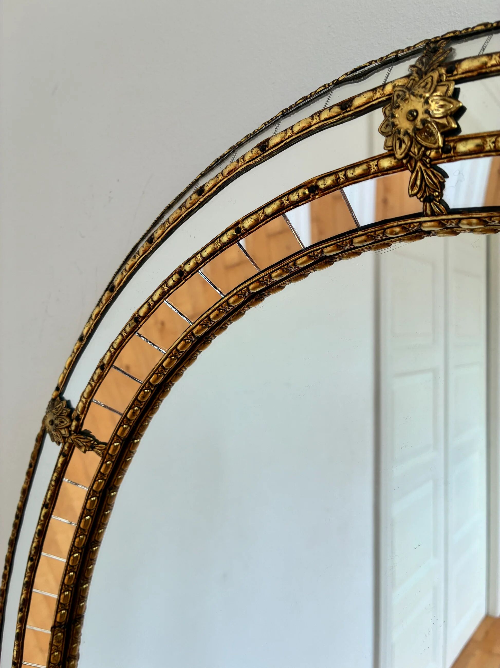 Vintage Spanish Venetian-style wall mirror, oval, brass, 1980s Hollywood Regency