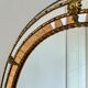 Vintage Spanish Venetian-style wall mirror, oval, brass, 1980s Hollywood Regency