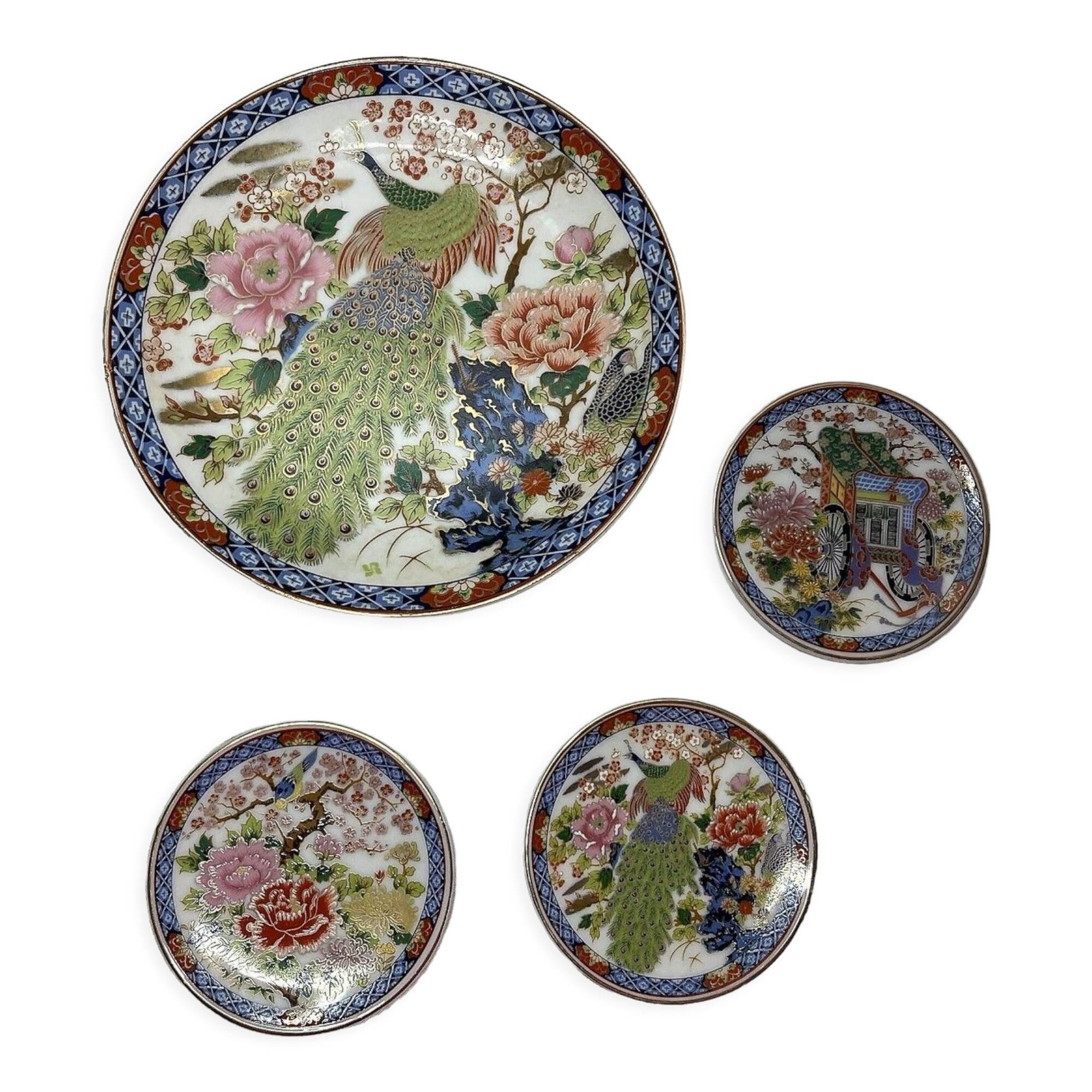 Set of 4 porcelain plates decoration peacock Japan XXth