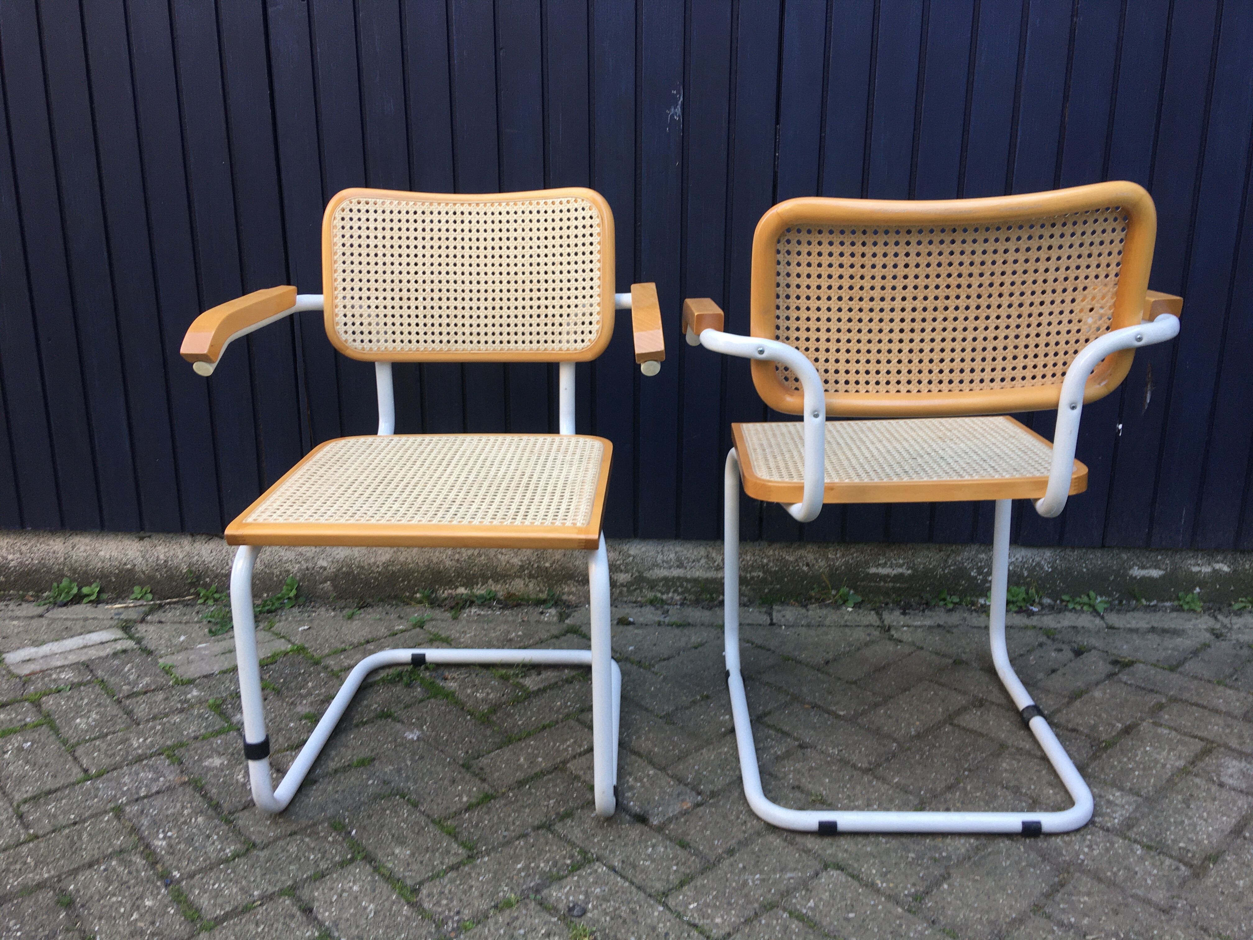 Marcel Breuer's white S64 armchairs