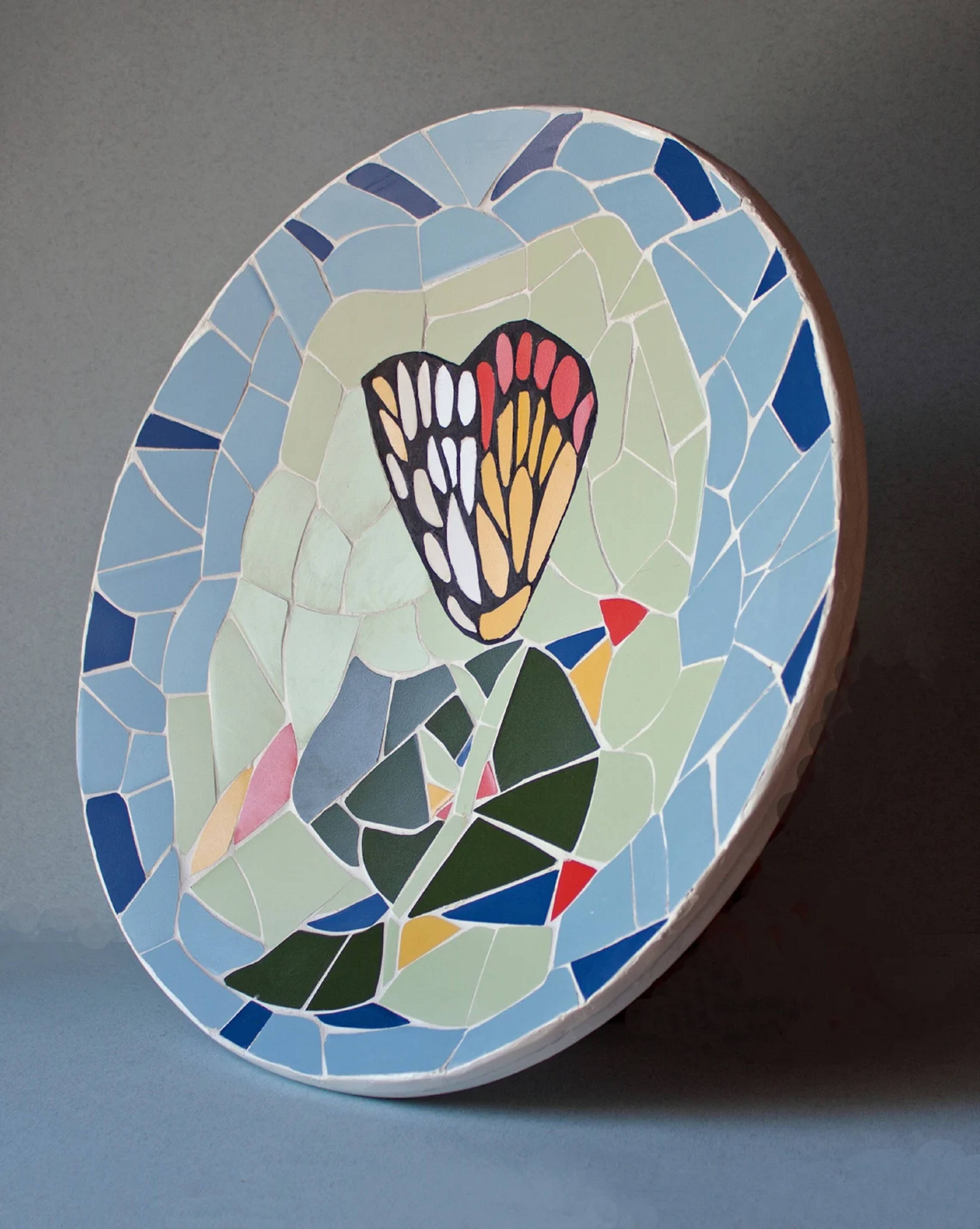Original plate decorated with colored ceramic with the Catalan modernist trencadís technique