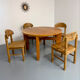 Extendable round table Maison Regain in solid elm, 1970s design.