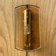 Brass wall lamp and smoked glass
