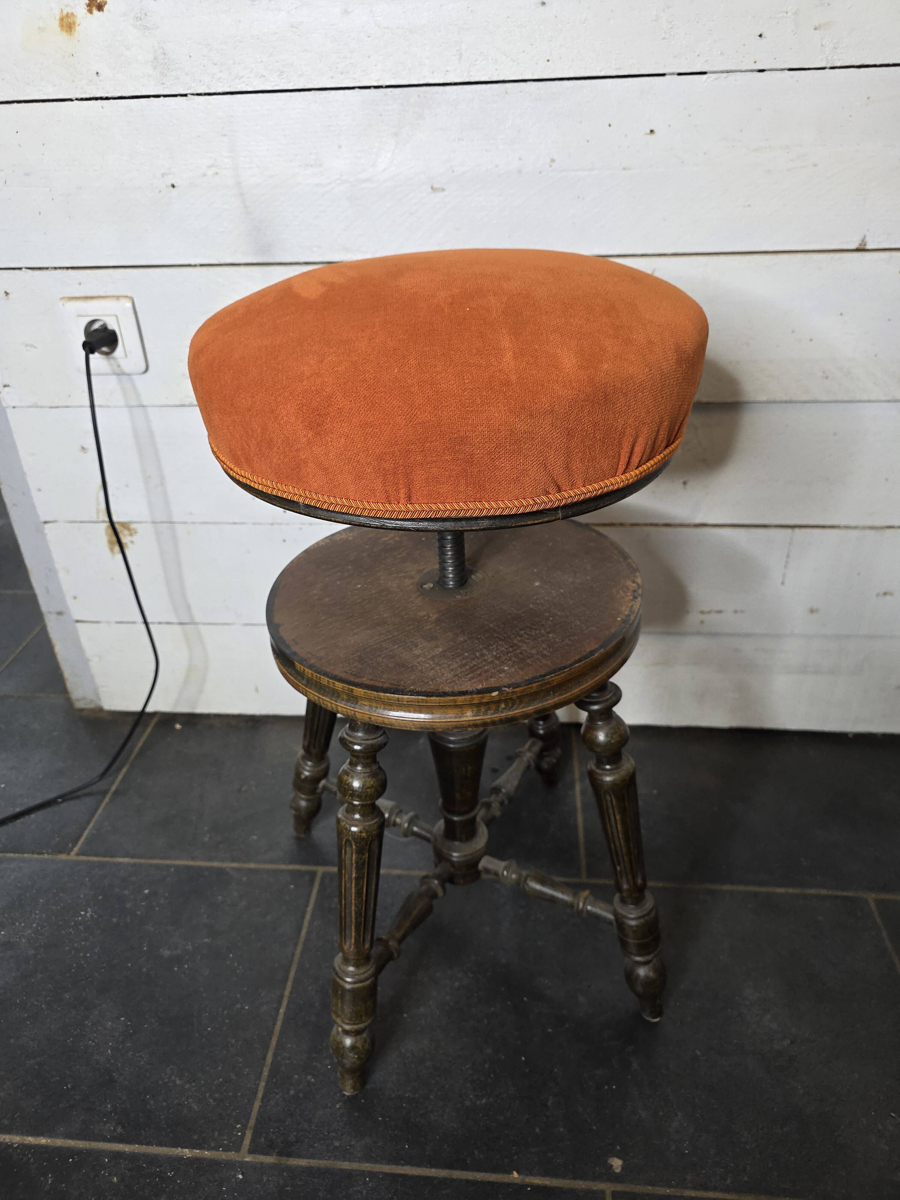 Antique adjustable piano stool