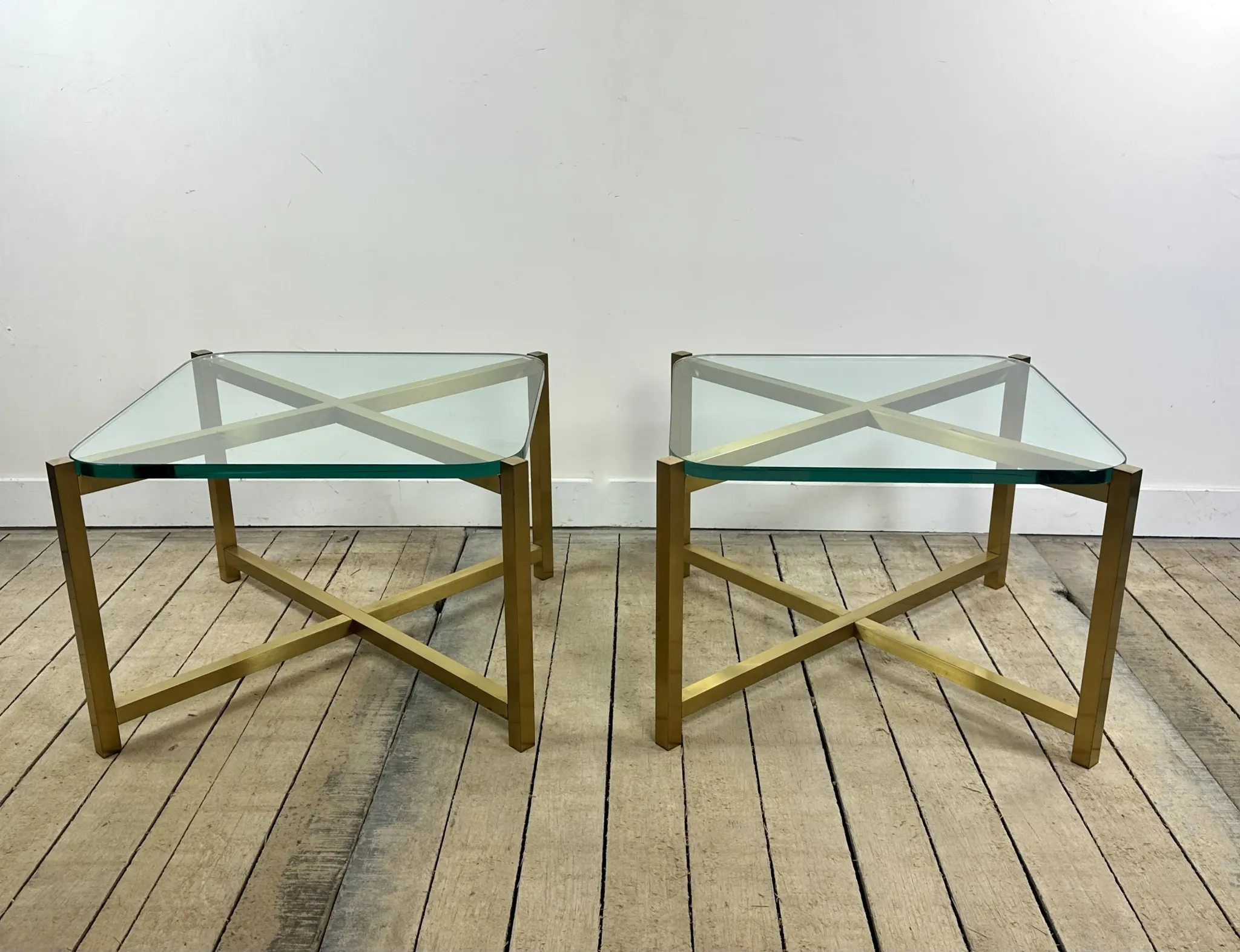 Pair of Italian brass and glass side tables from the 1970s.