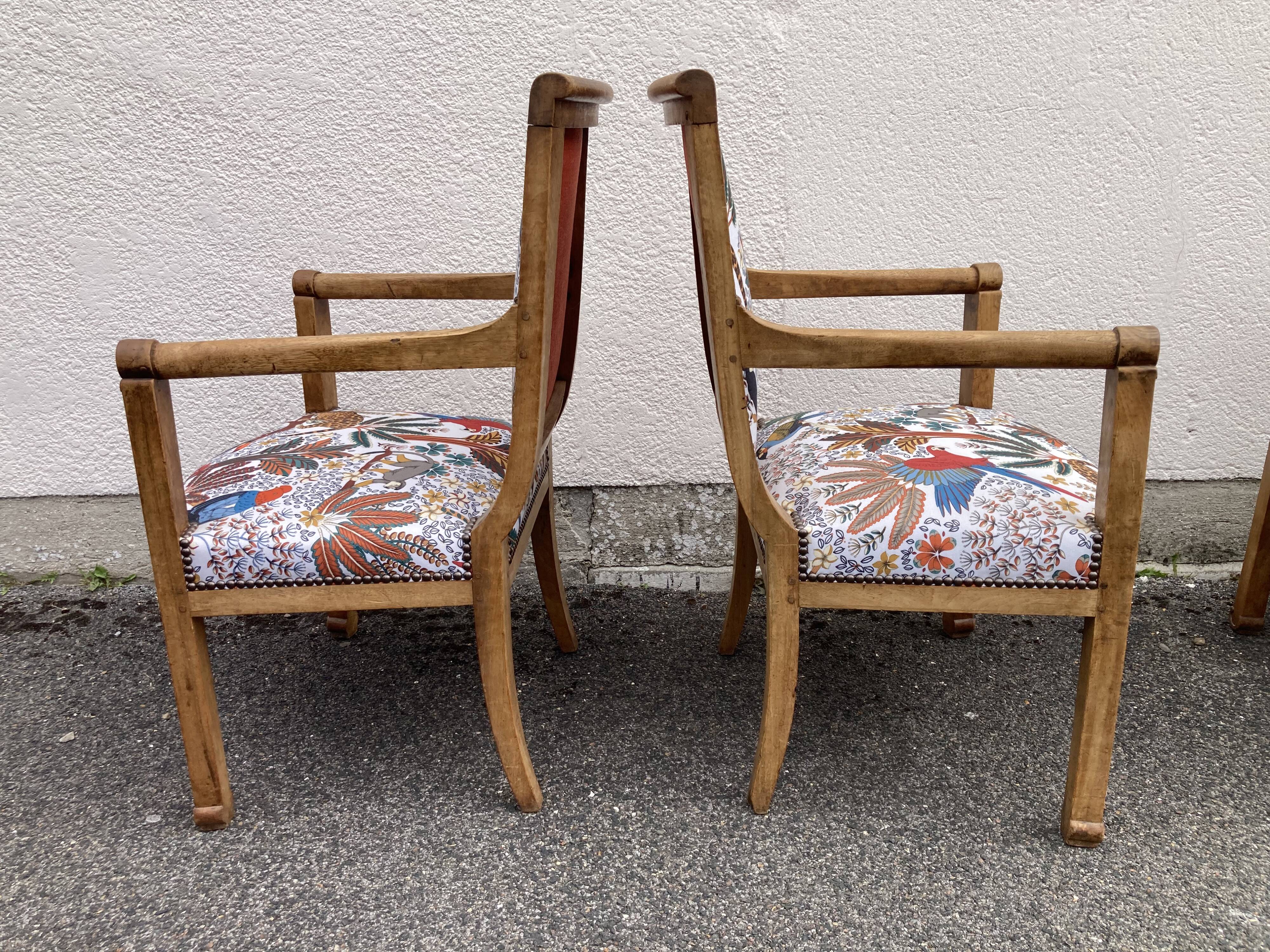 Set of four reupholstered Directoire period armchairs.
