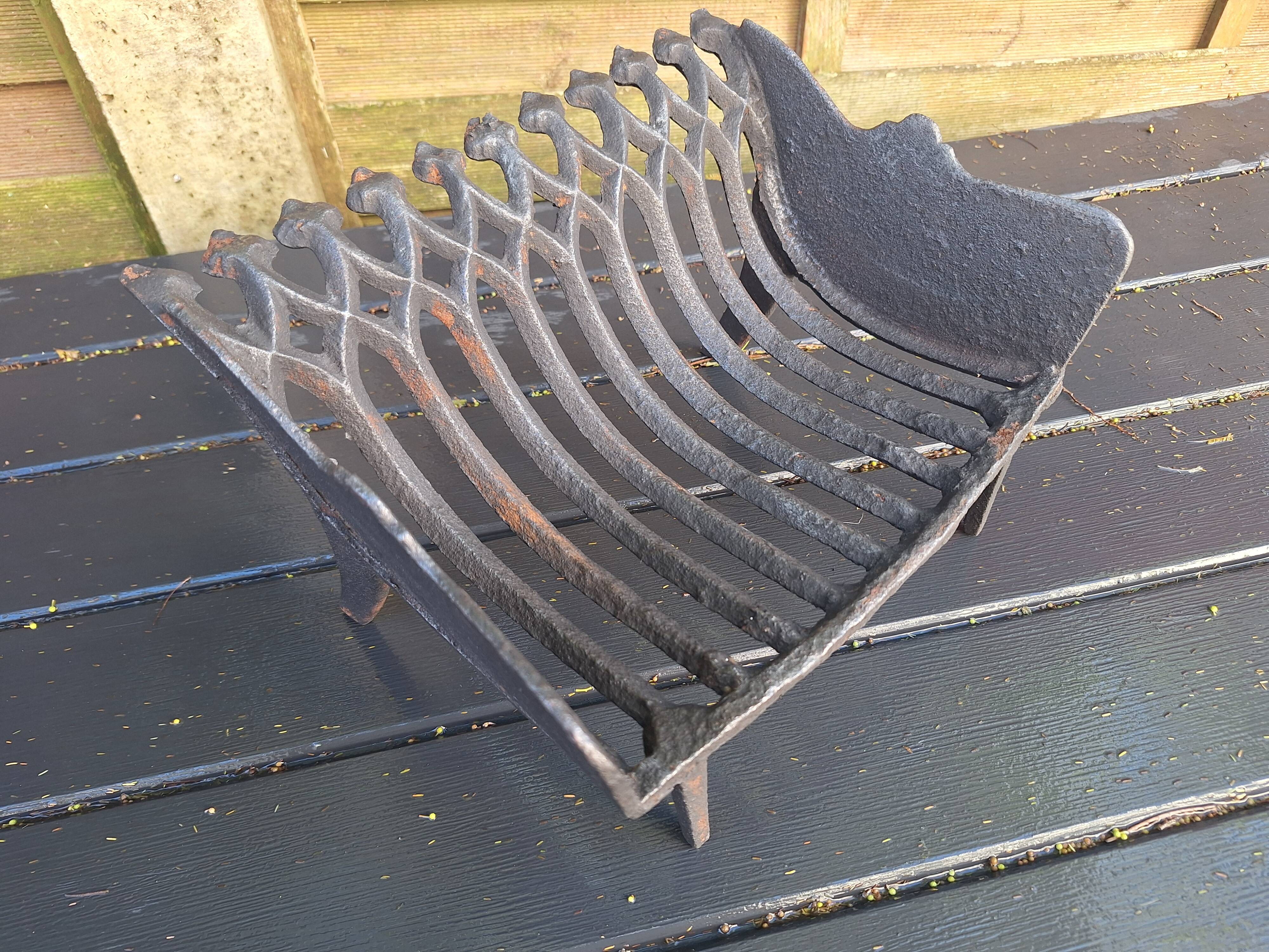 Antique cast iron log holder/ember holder for fireplace