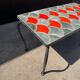 Ceramic coffee table with scales from the 1950s.
