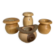 Four solid turned wooden vases