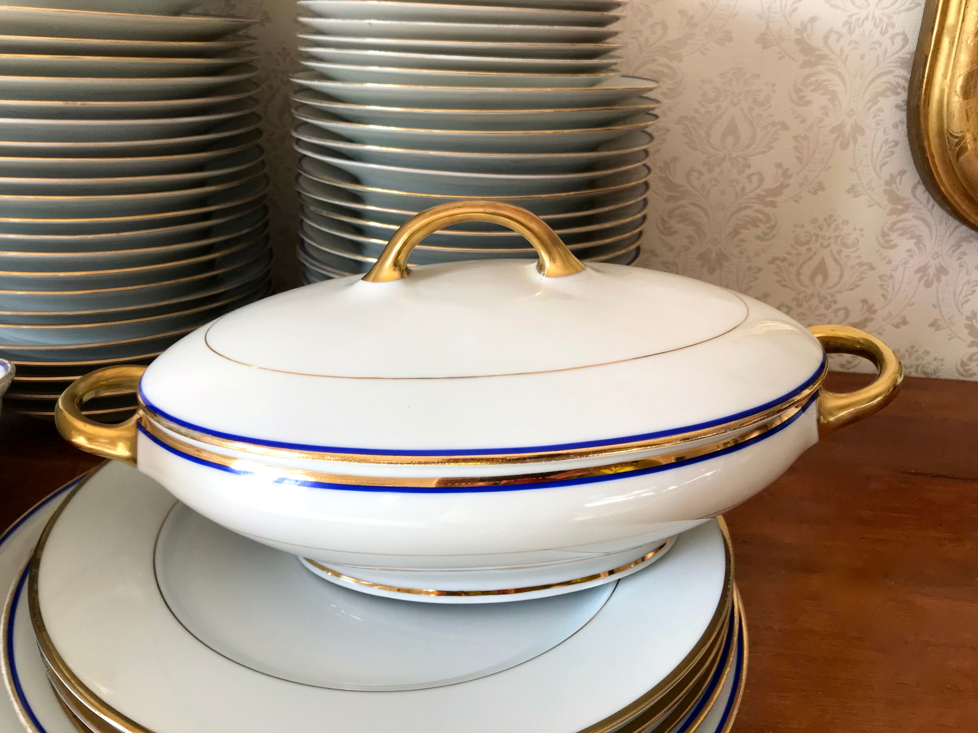 table service art deco limoges porcelain white border blue and gold 61 pieces signed
