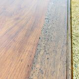 Old French farmhouse table in walnut with turned legs.