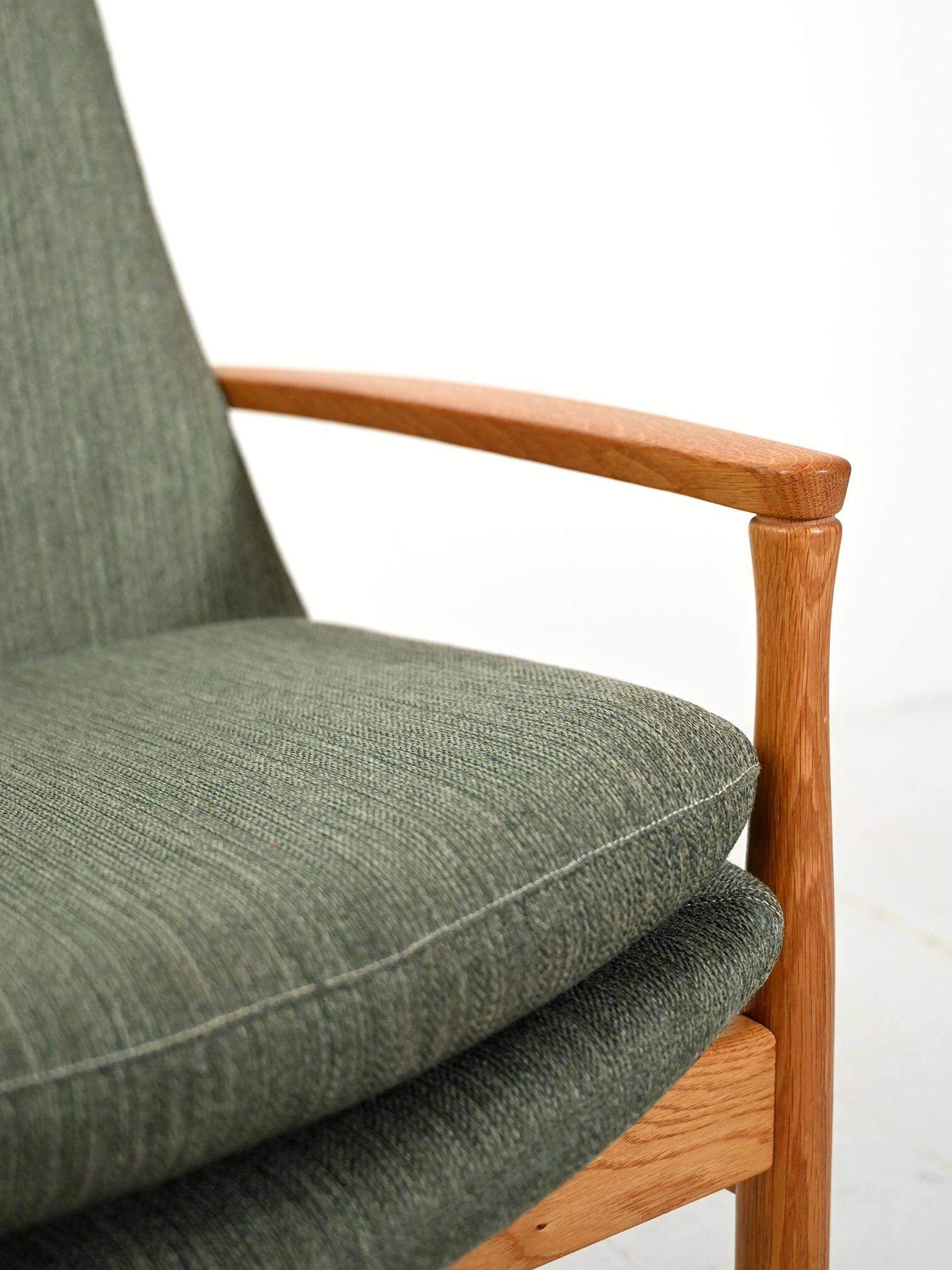 Scandinavian oak and sage-green wool armchair