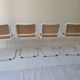 B32 chairs by Marcel Breuer in white.