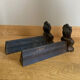Pair of cast iron andirons from the 19th century, busts of women