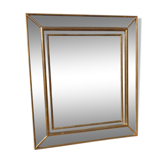Ancien miroir à pare close